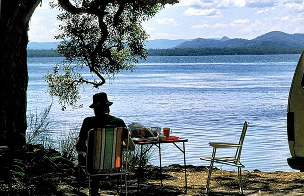 Sitting by the water at Mungo Brush Campsite - one of many weekend 4WD adventures from Sydney